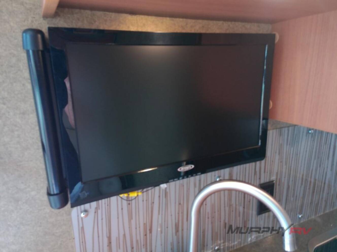 A photo of this 2013 Itasca Navion IQ 24V