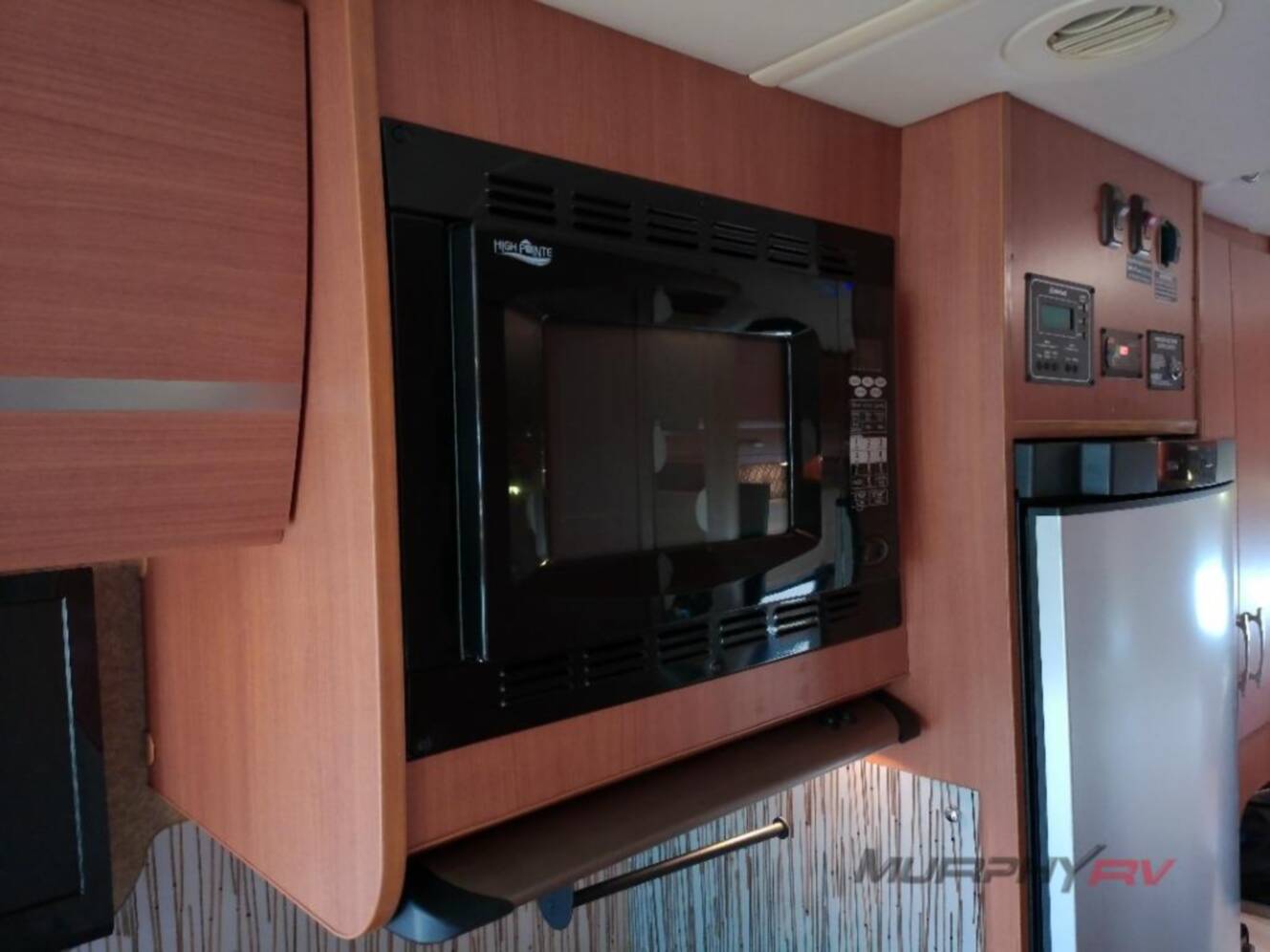 A photo of this 2013 Itasca Navion IQ 24V