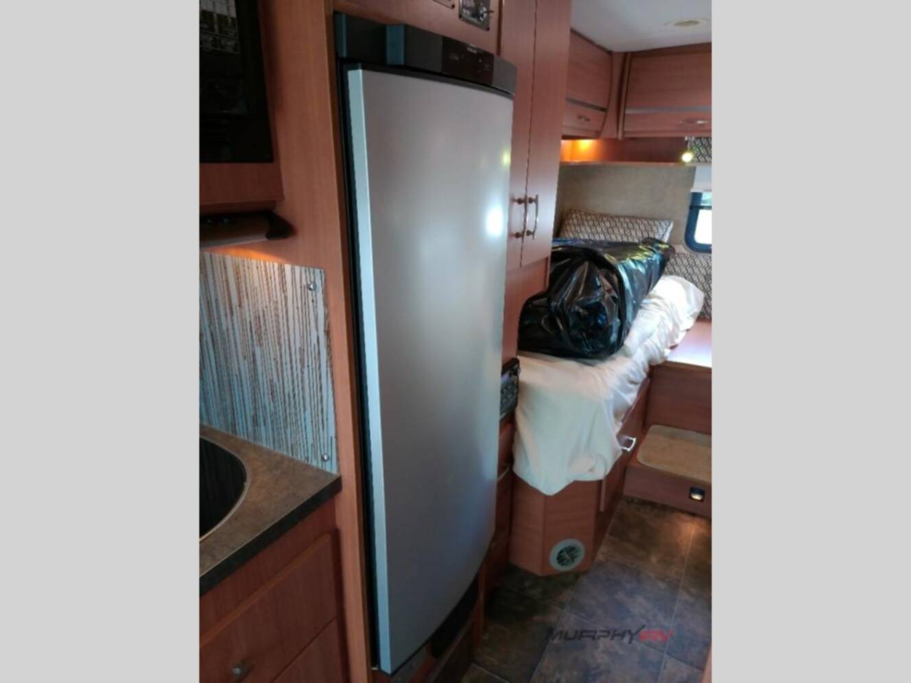 A photo of this 2013 Itasca Navion IQ 24V