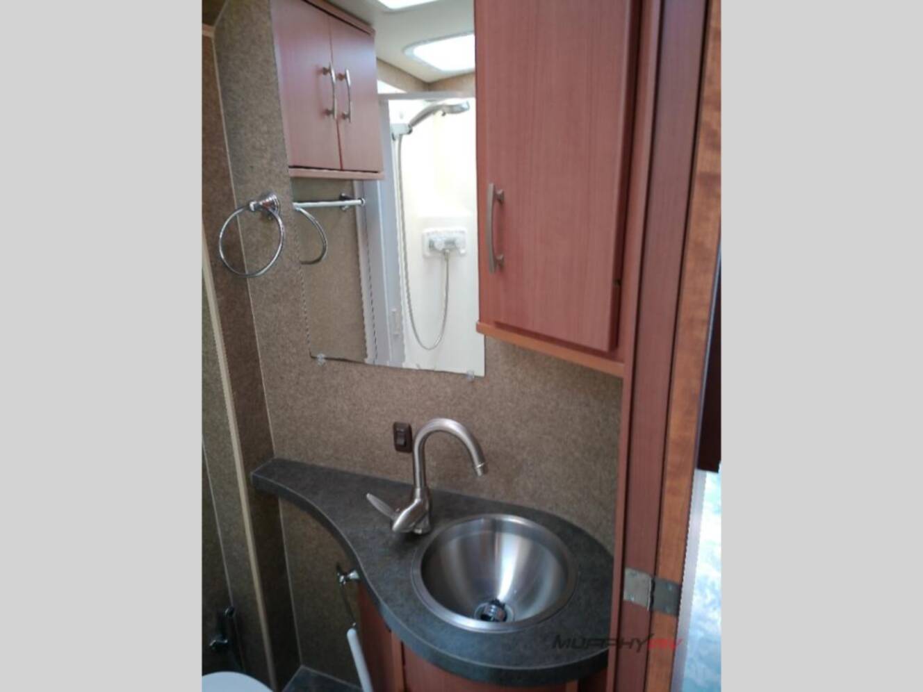 A photo of this 2013 Itasca Navion IQ 24V