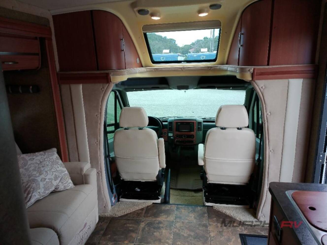 A photo of this 2013 Itasca Navion IQ 24V
