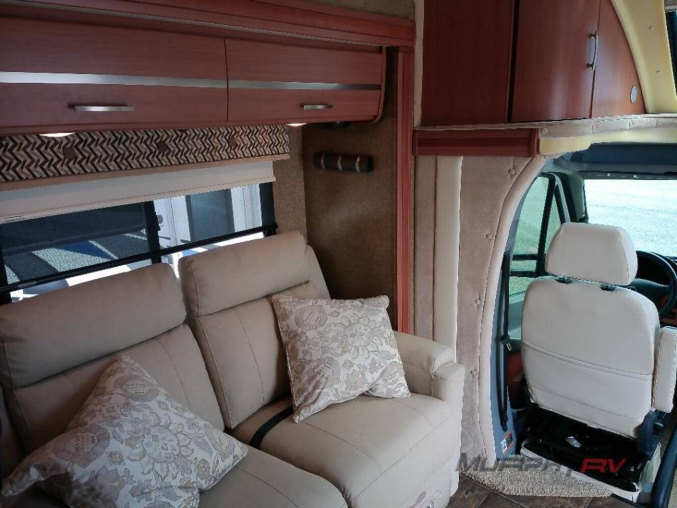 A photo of this 2013 Itasca Navion IQ 24V