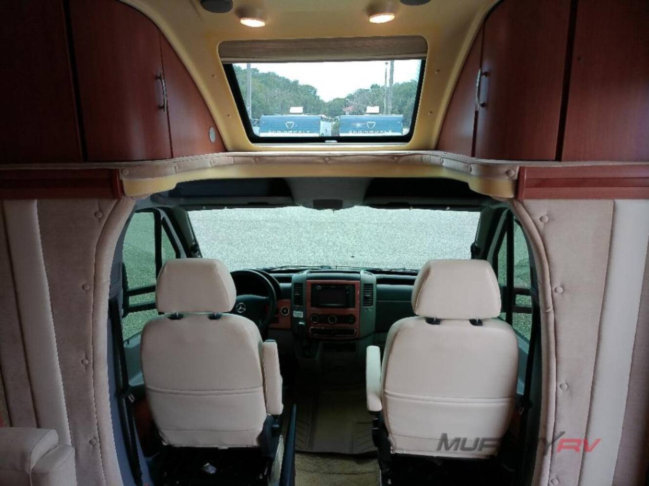A photo of this 2013 Itasca Navion IQ 24V