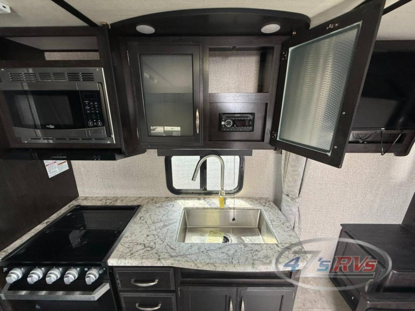 A photo of this 2019 Grand Design Imagine XLS 21BHE