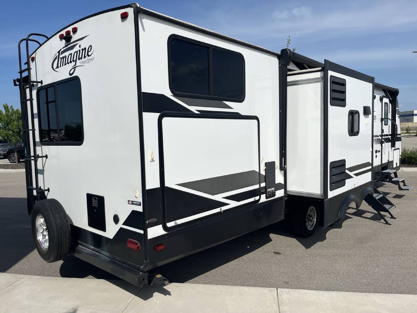 A photo of this 2021 Grand Design IMAGINE 3250BH