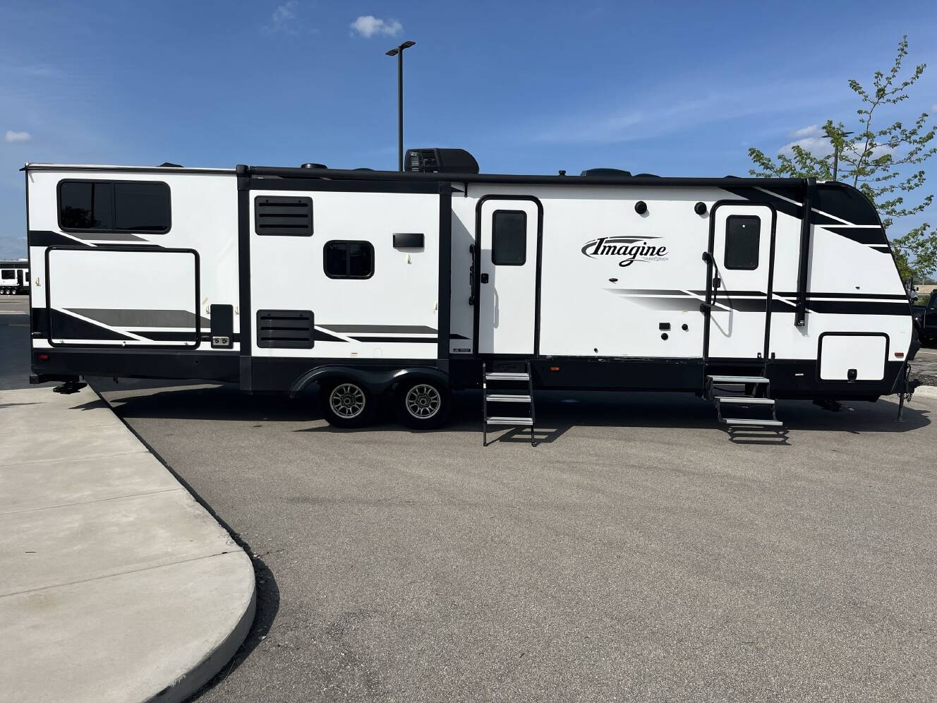 A photo of this 2021 Grand Design IMAGINE 3250BH