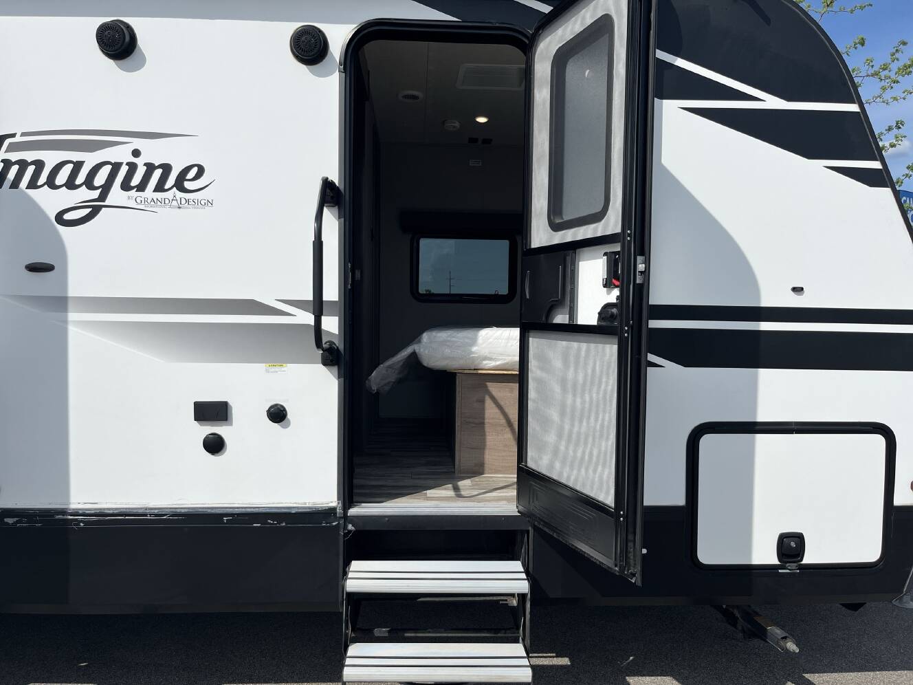 A photo of this 2021 Grand Design IMAGINE 3250BH