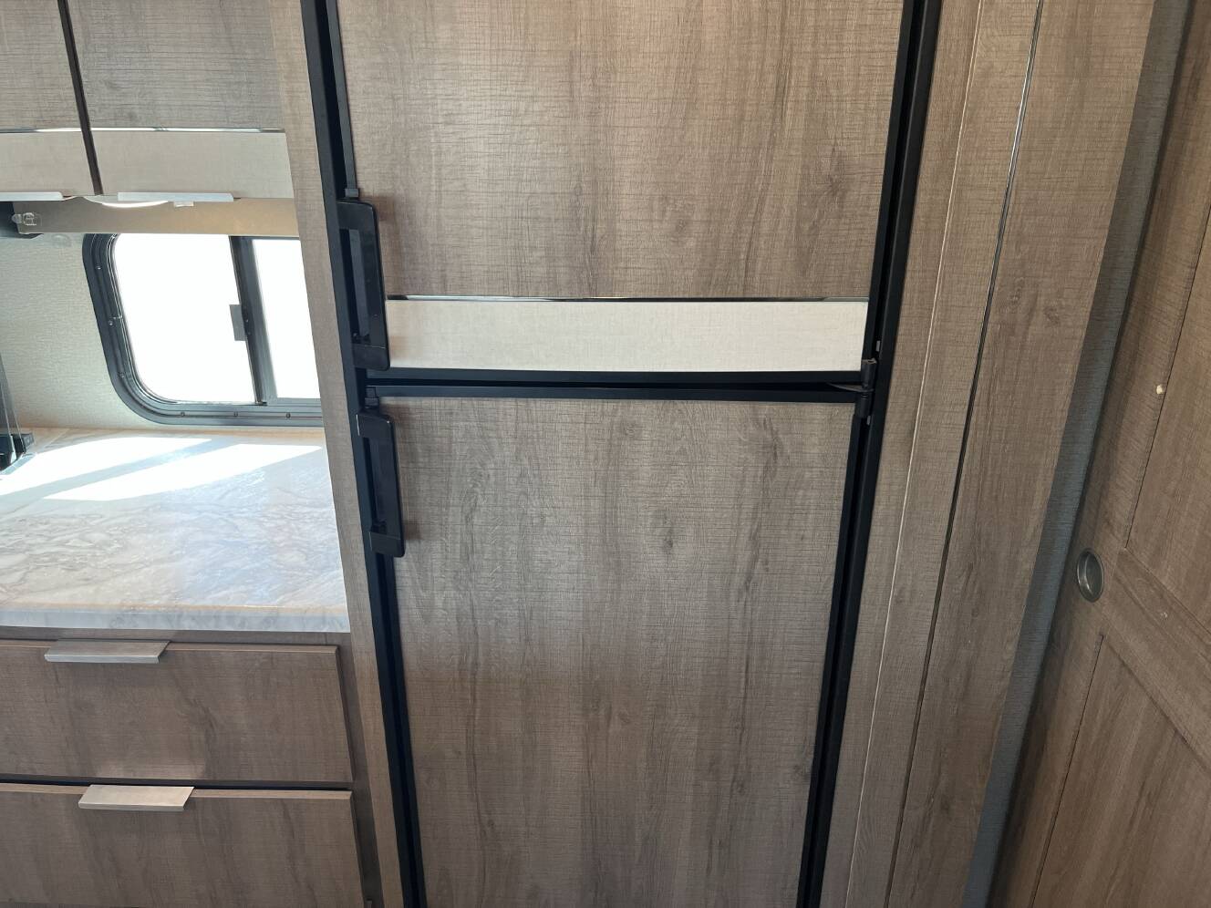 A photo of this 2021 Grand Design IMAGINE 3250BH