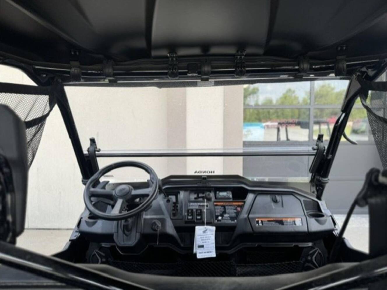 A photo of this 2025 Honda Pioneer 1000-5 Deluxe