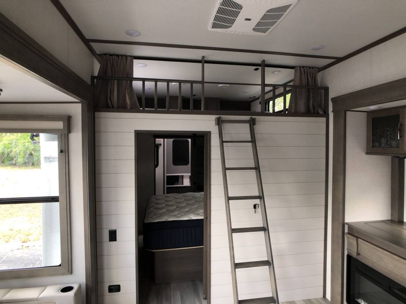 A photo of this 2024 Grand Design Solitude 391DL