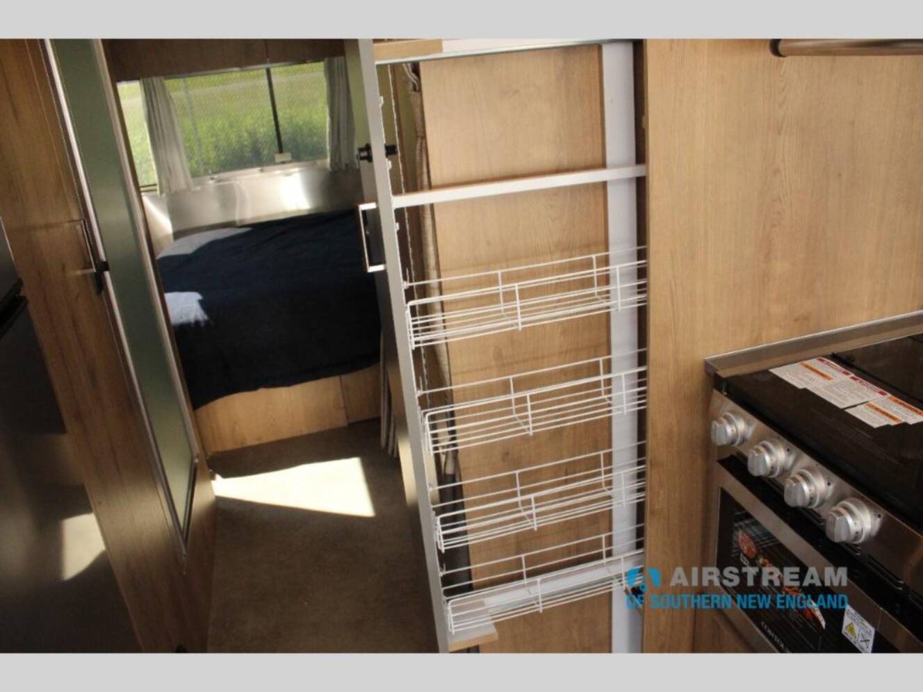 A photo of this 2026 Airstream Trade Wind 25FBQ