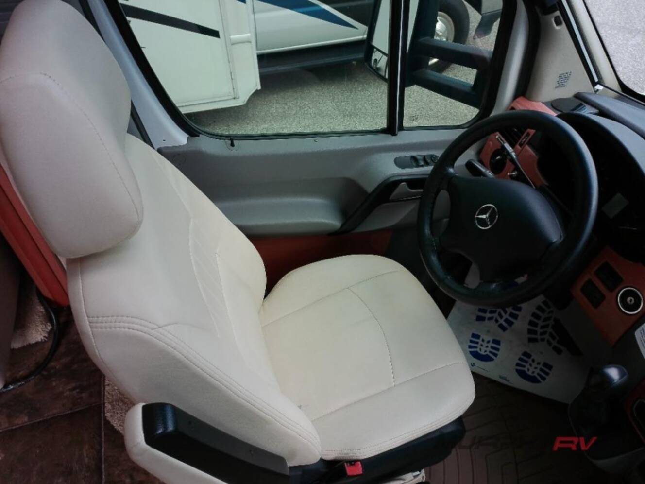 A photo of this 2013 Itasca Navion IQ 24V
