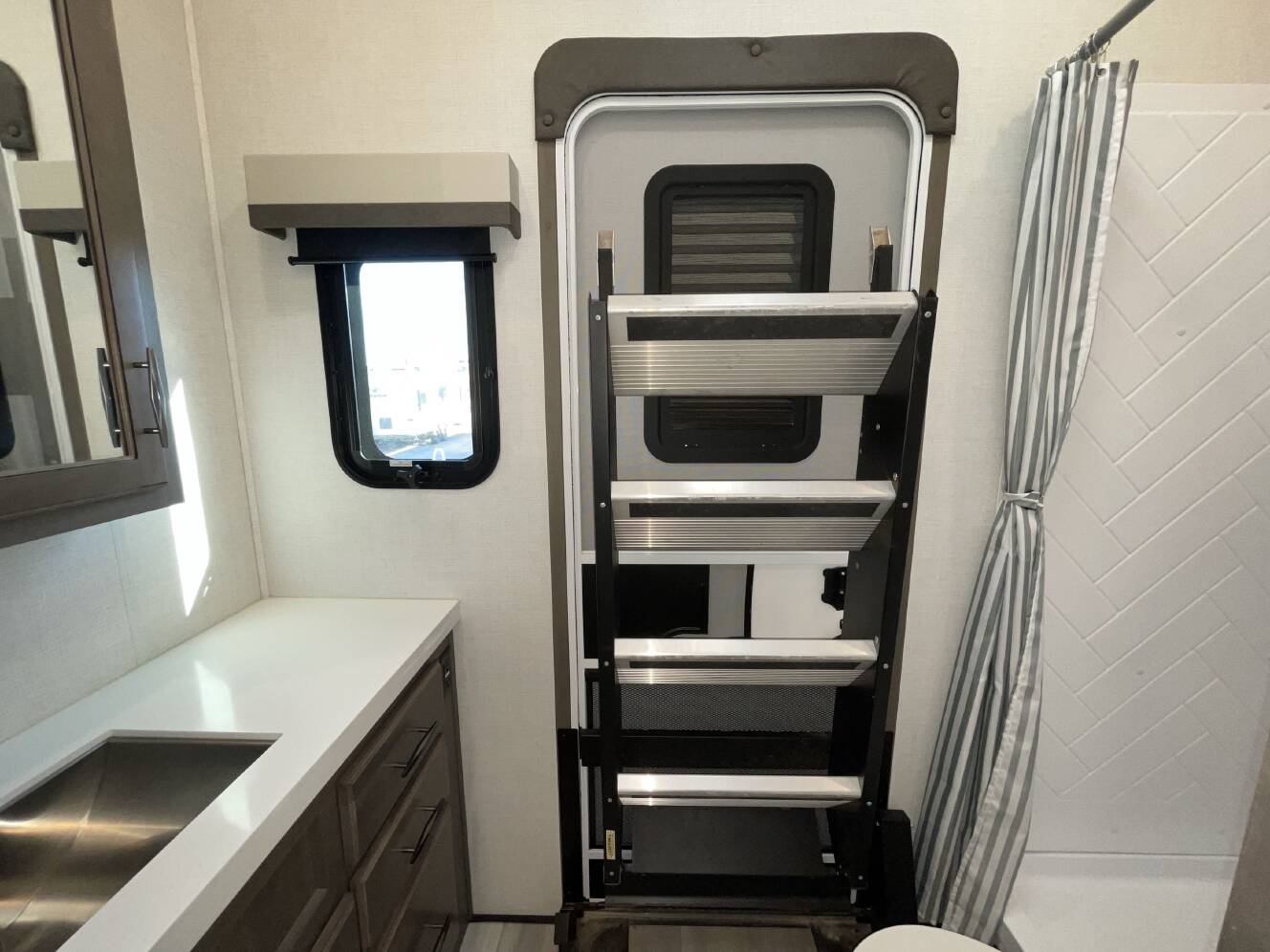 A photo of this 2024 Grand Design SOLITUDE 391DL