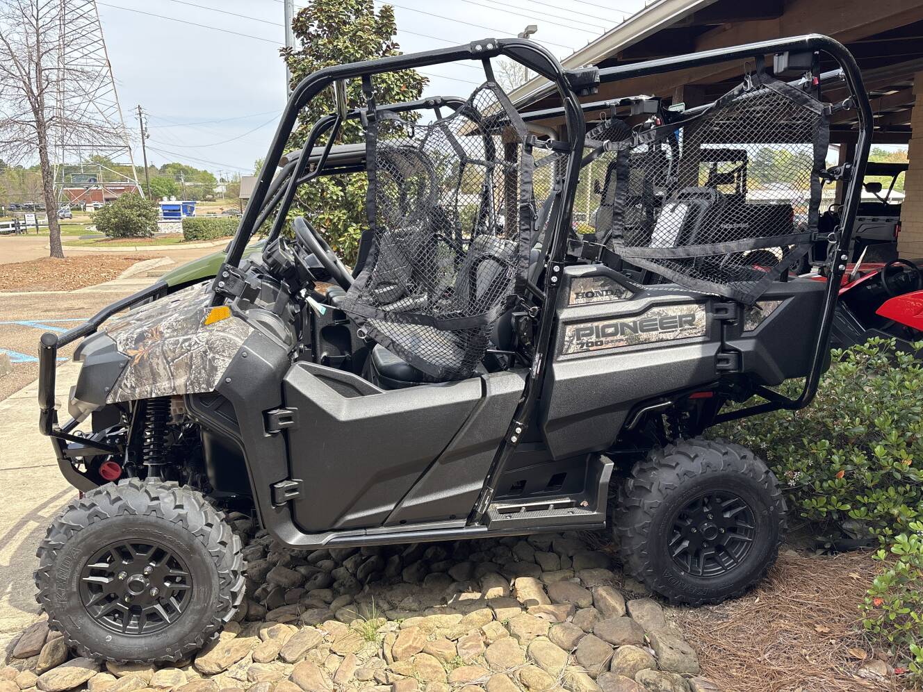A photo of this 2026 Honda Pioneer 700-4 Forest