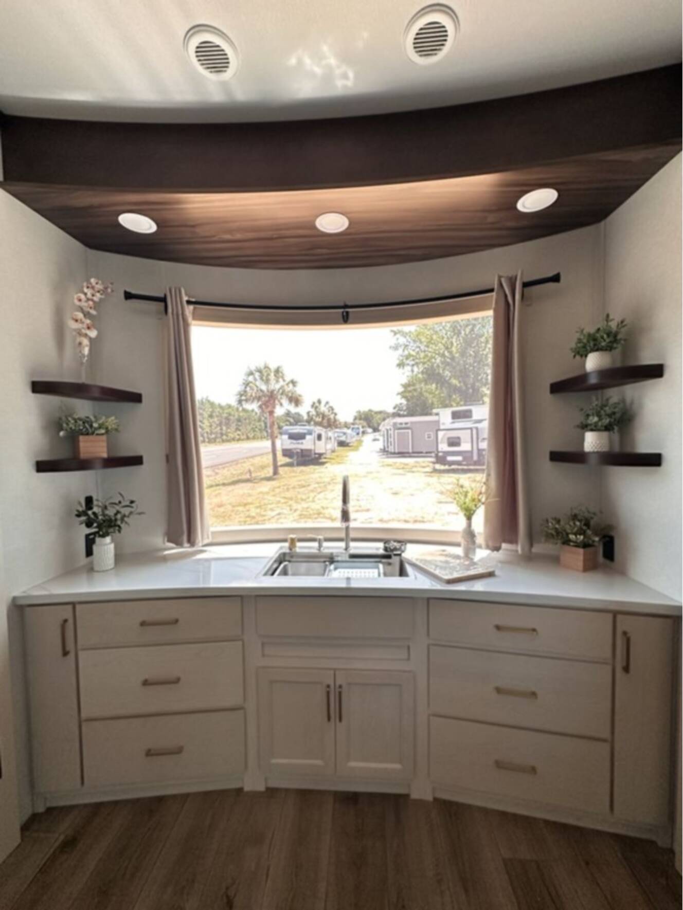 A photo of this 2026 Forest River Cedar Creek Cedar Cottage Destination 40CMK