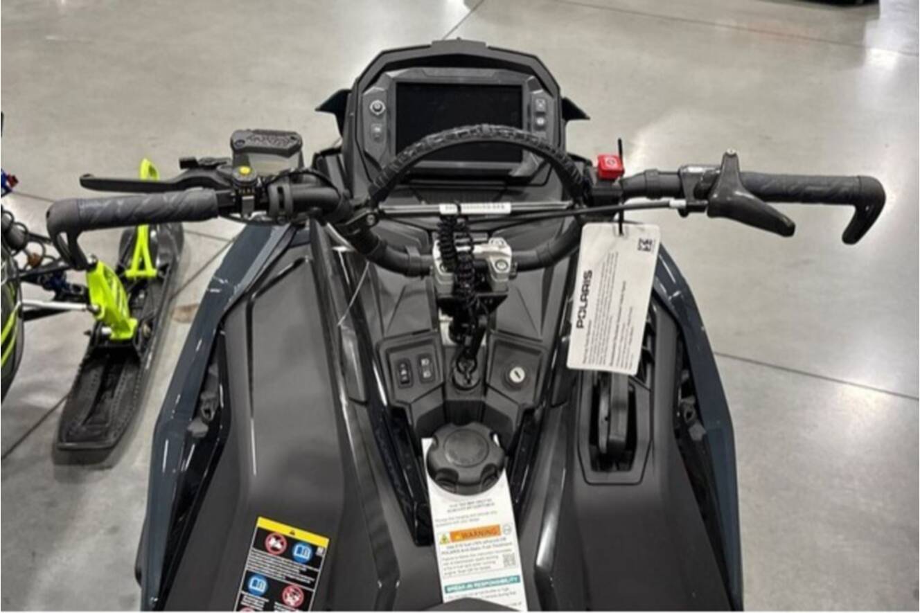 A photo of this 2026 Polaris® SNO-26 BOOST RMK KHAOS 155 Patriot Boost