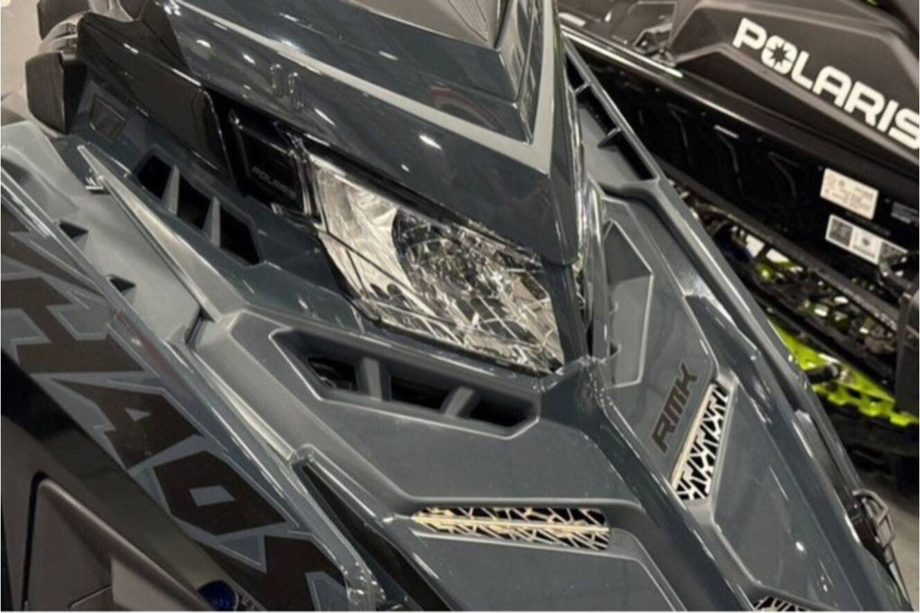 A photo of this 2026 Polaris® SNO-26 BOOST RMK KHAOS 155 Patriot Boost