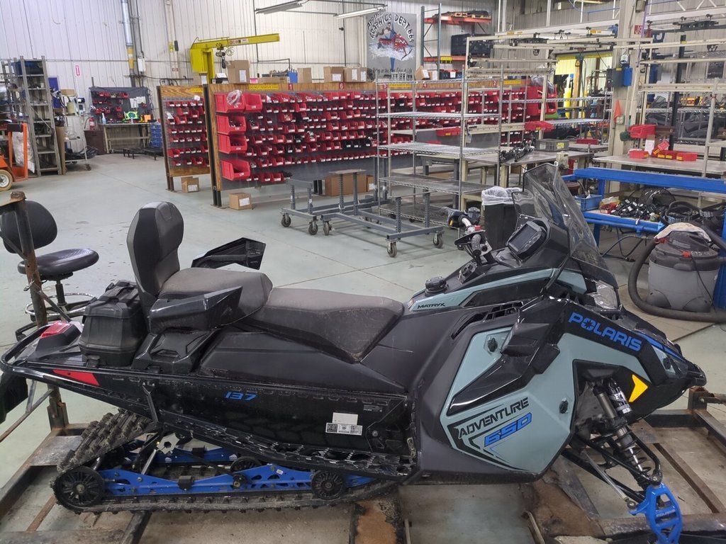 2026 Polaris® 650 INDY Adventure 137 Hemlock Blue / Black / Velocity  650 137 in ann arbor MI