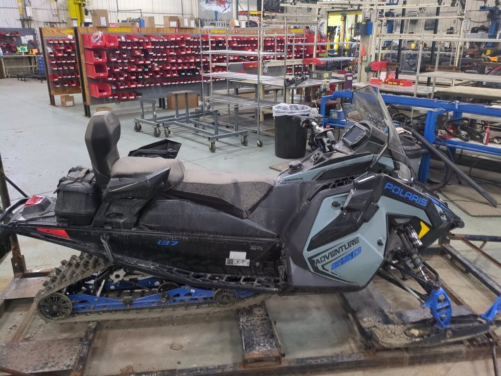 2026 Polaris® 650 INDY Adventure 137 Hemlock Blue / Black / Velocity  650 137 in ann arbor MI