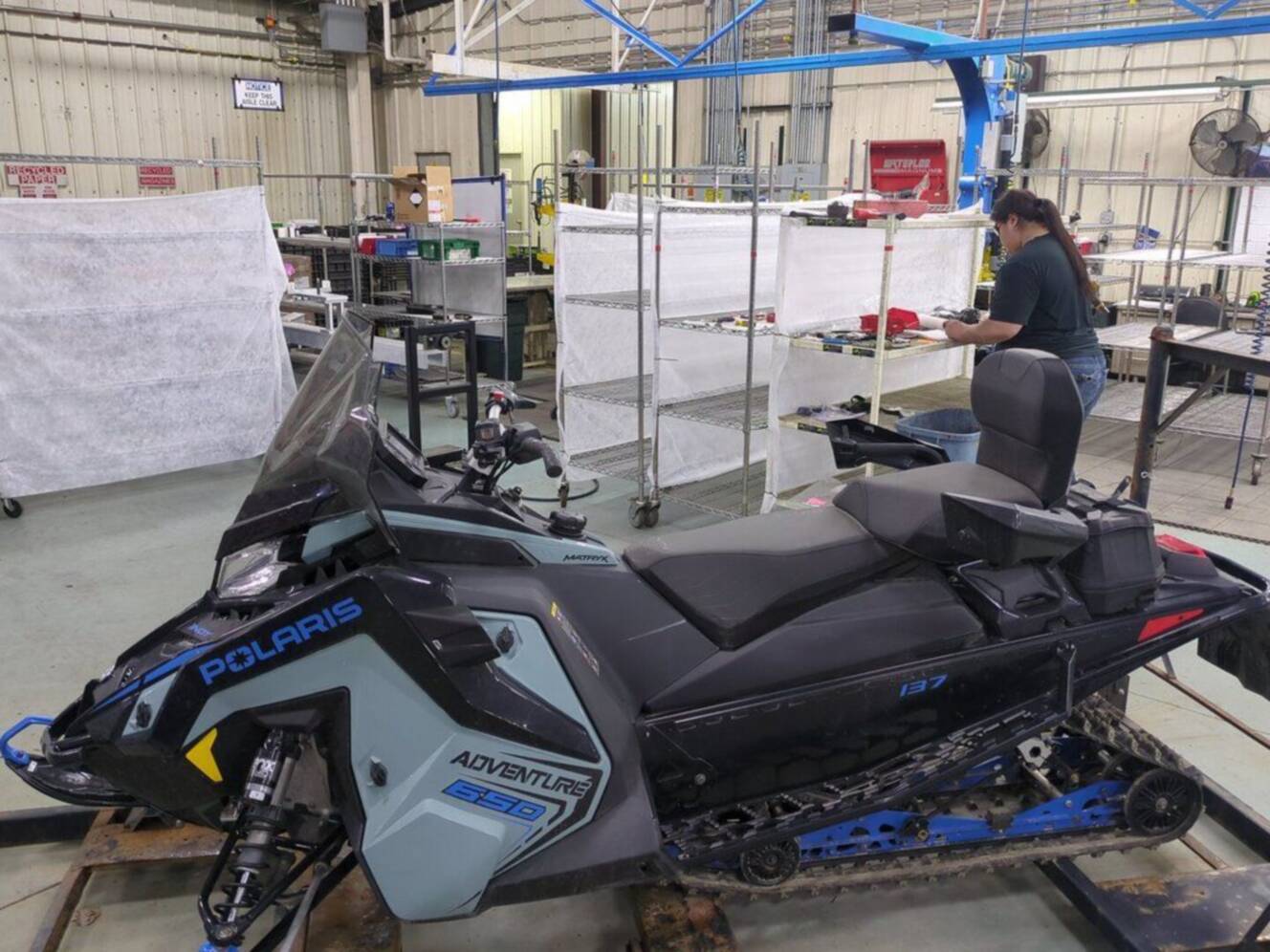 A photo of this 2026 Polaris® 650 INDY Adventure 137 Hemlock Blue / Black / Velocity 