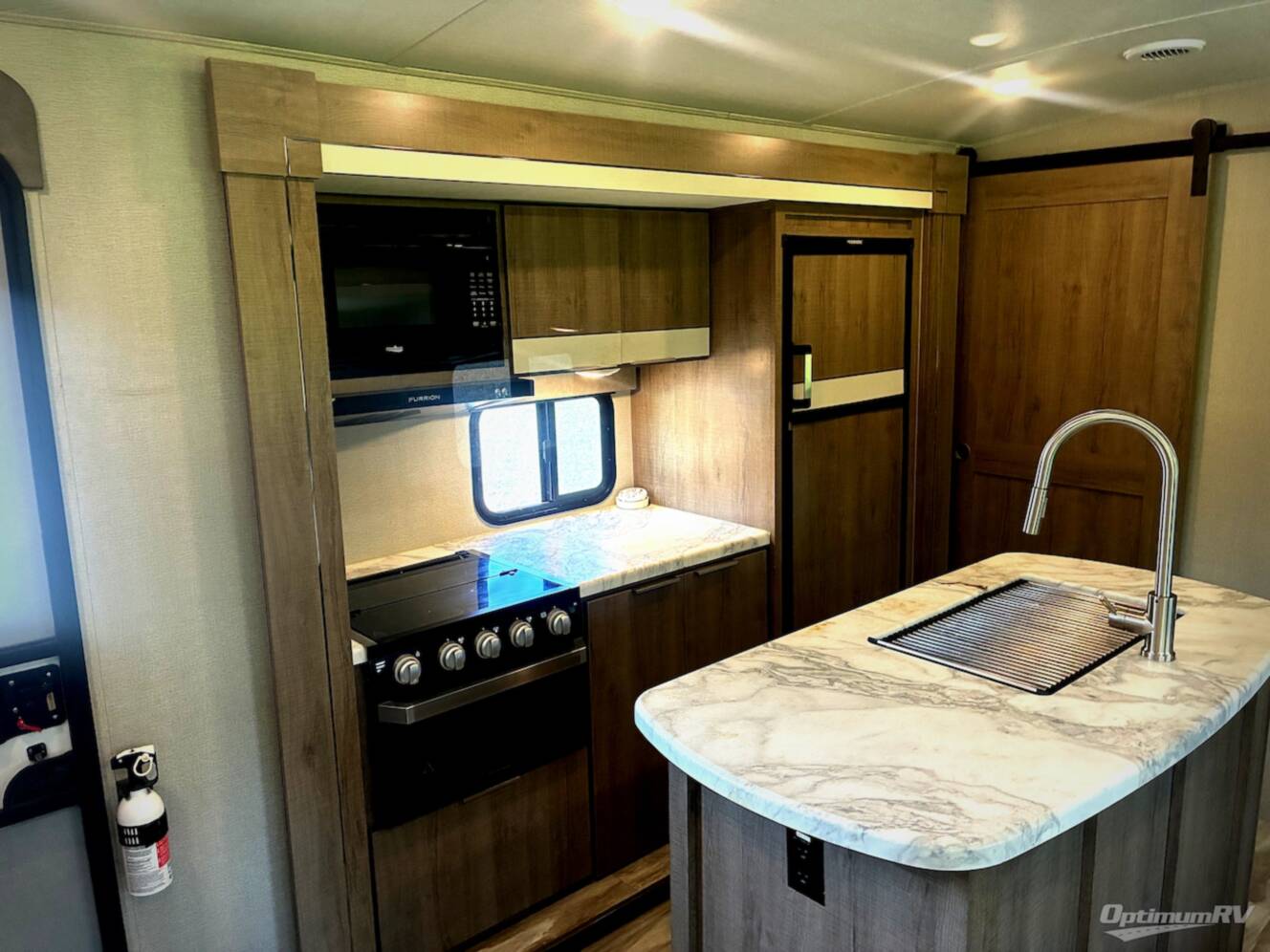 A photo of this 2020 Grand Design Imagine 3250BH