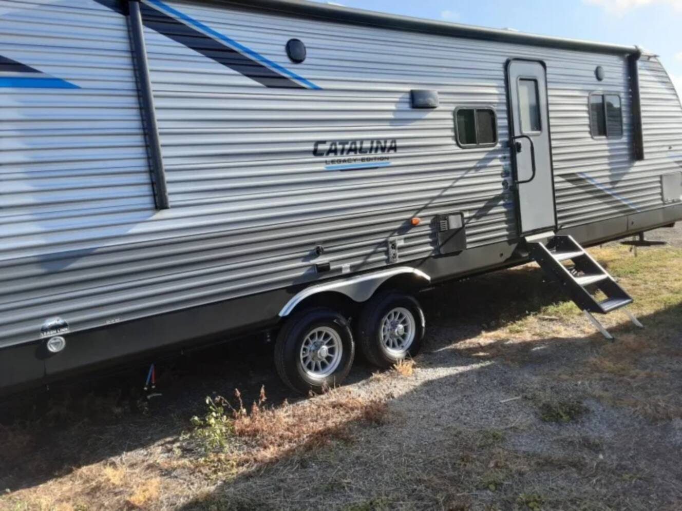 A photo of this 2022 Coachmen Catalina Legacy 343BHTS Front Master Bedroom