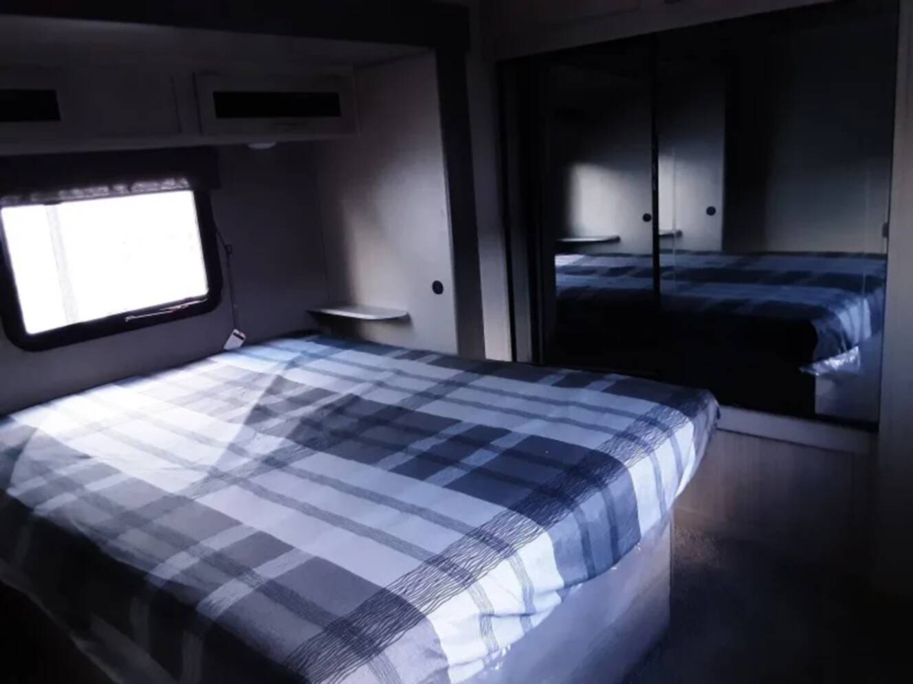 A photo of this 2022 Coachmen Catalina Legacy 343BHTS Front Master Bedroom