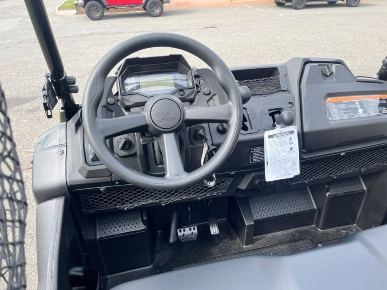 A photo of this 2026 Honda® Pioneer 700 Deluxe