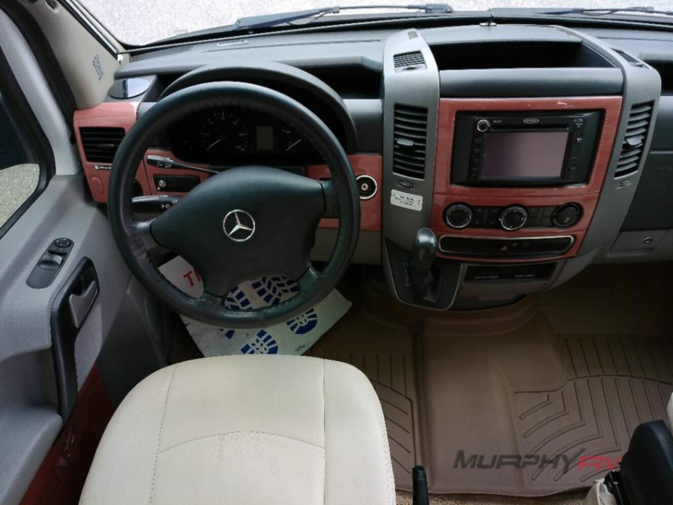 A photo of this 2013 Itasca Navion IQ 24V