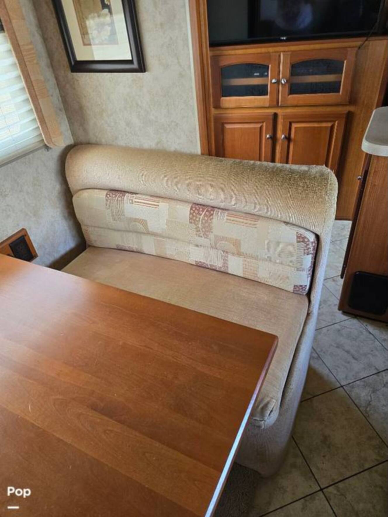 A photo of this 2011 Winnebago Adventurer 35P