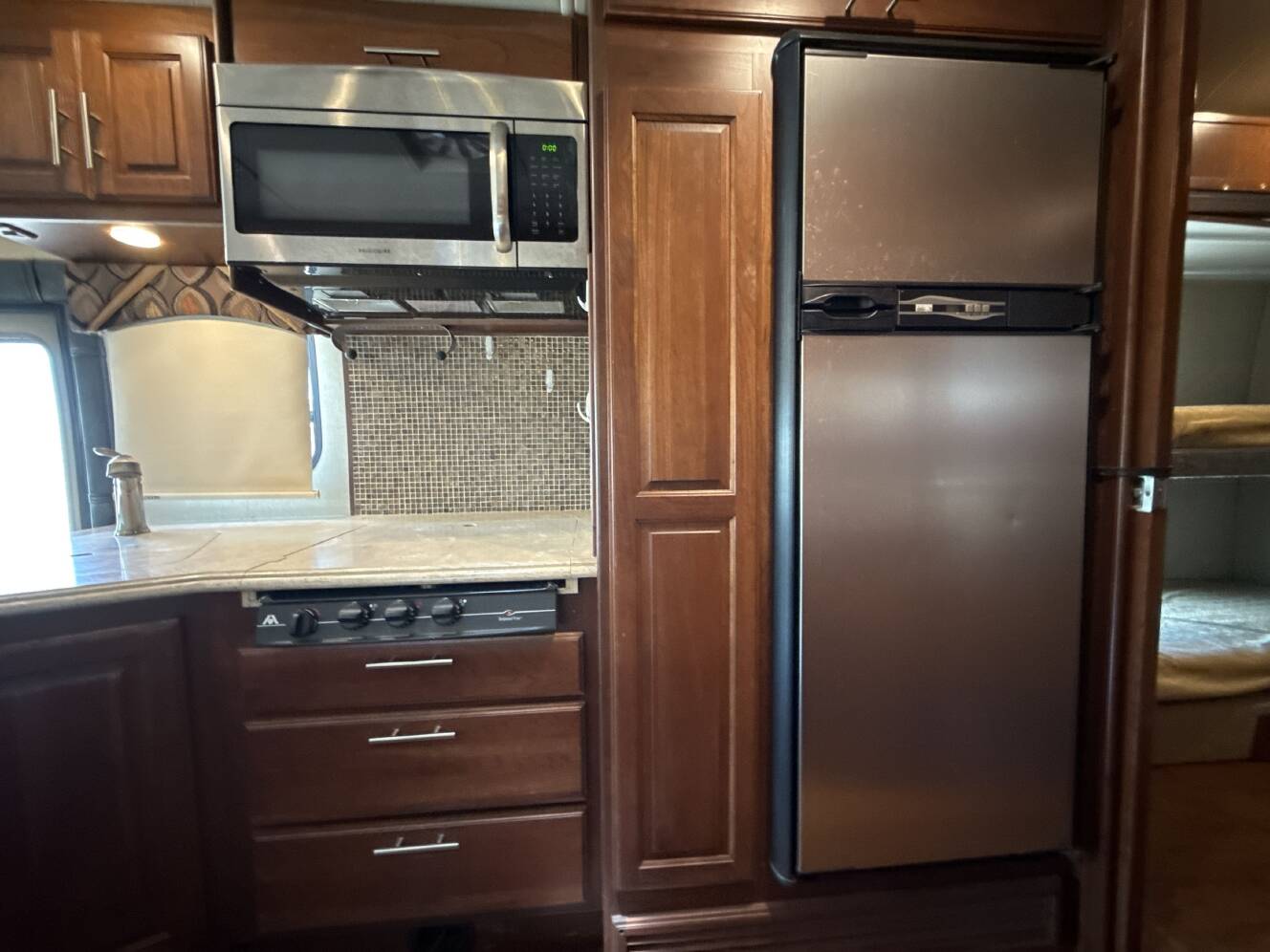 A photo of this 2013 Dynamax DX3 37BHHD