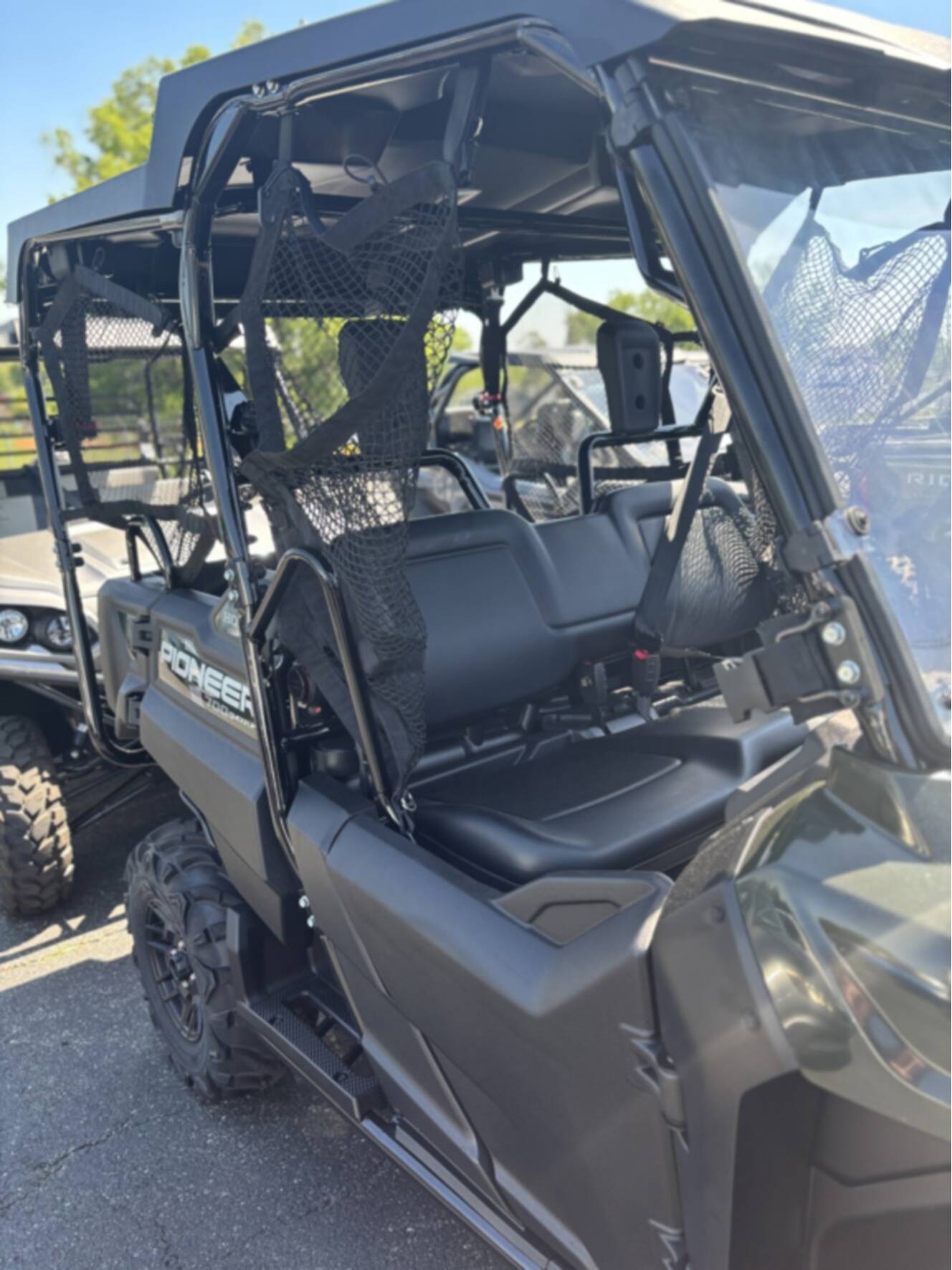 A photo of this 2025 Honda PIONEER 700-4 DELUXE Deluxe