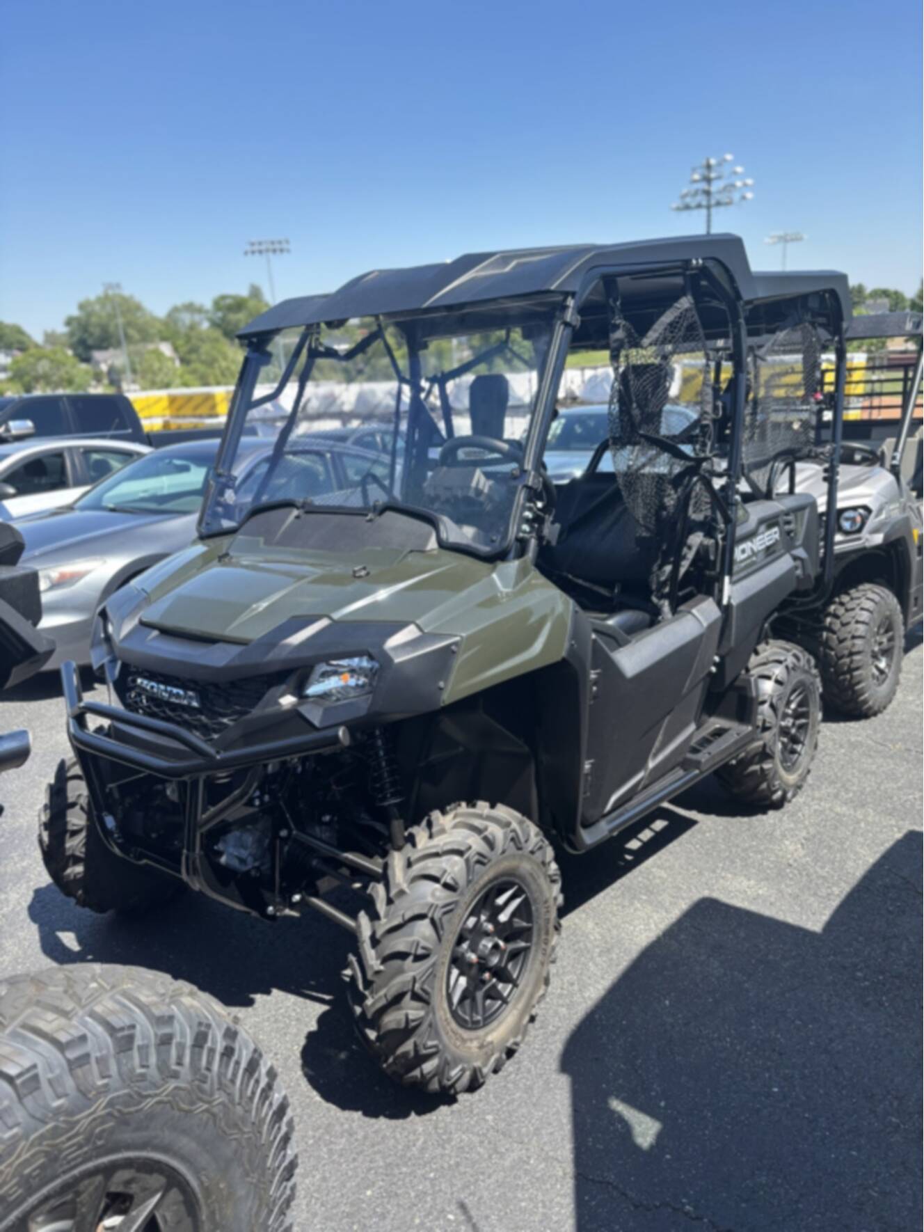 A photo of this 2025 Honda PIONEER 700-4 DELUXE Deluxe