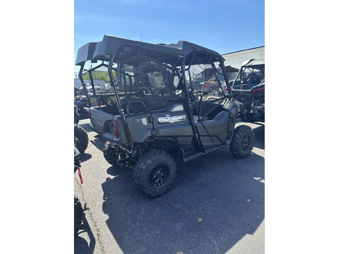 A photo of this 2025 Honda PIONEER 700-4 DELUXE Deluxe