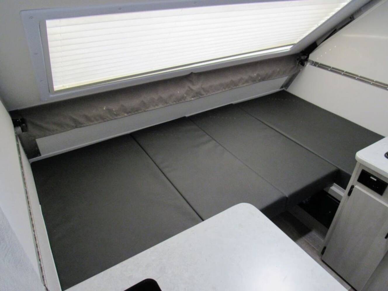 A photo of this 2025 Aliner Ranger 10 Dual Bed