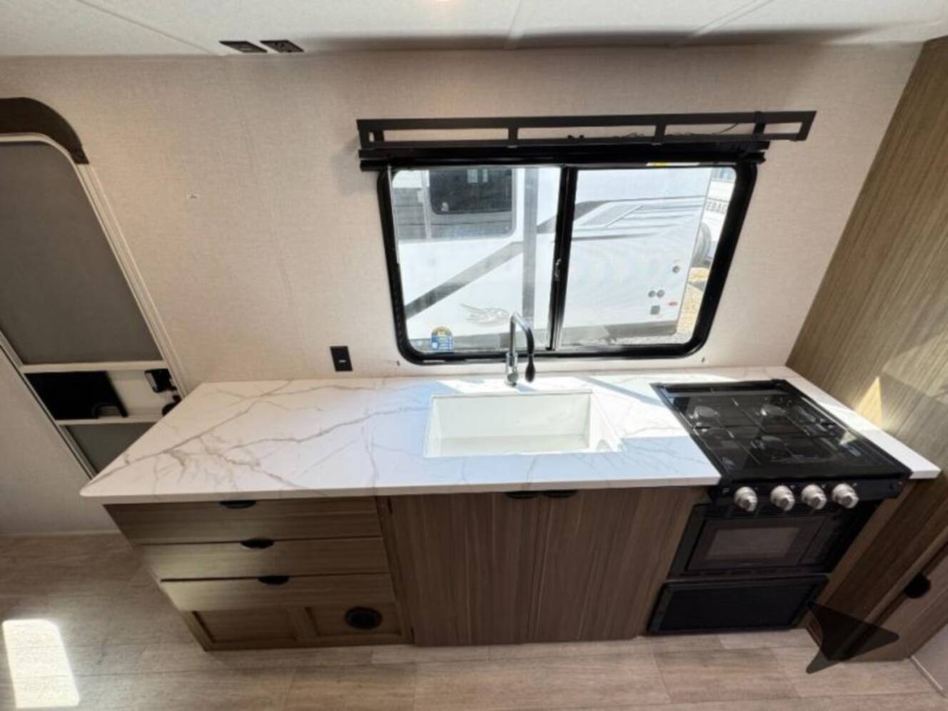 A photo of this 2026 Forest River Rv Wildwood FSX 233RBLE