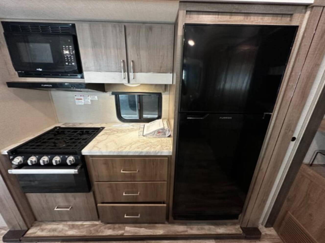 A photo of this 2022 Grand Design Imagine 3250BH