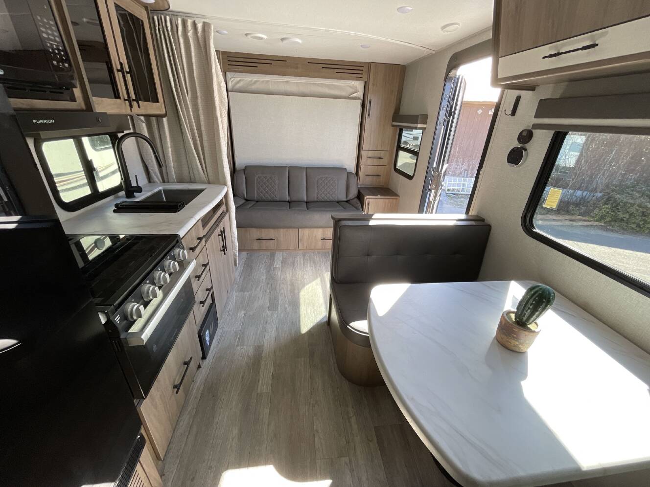 A photo of this 2023 Grand Design IMAGINE XLS 21BHE