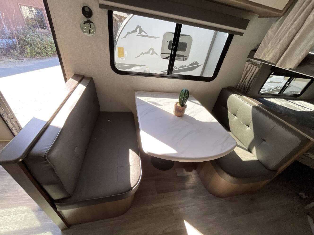 A photo of this 2023 Grand Design IMAGINE XLS 21BHE