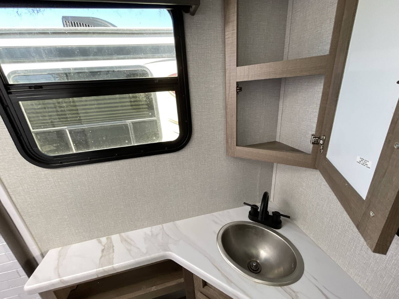 A photo of this 2023 Grand Design IMAGINE XLS 21BHE