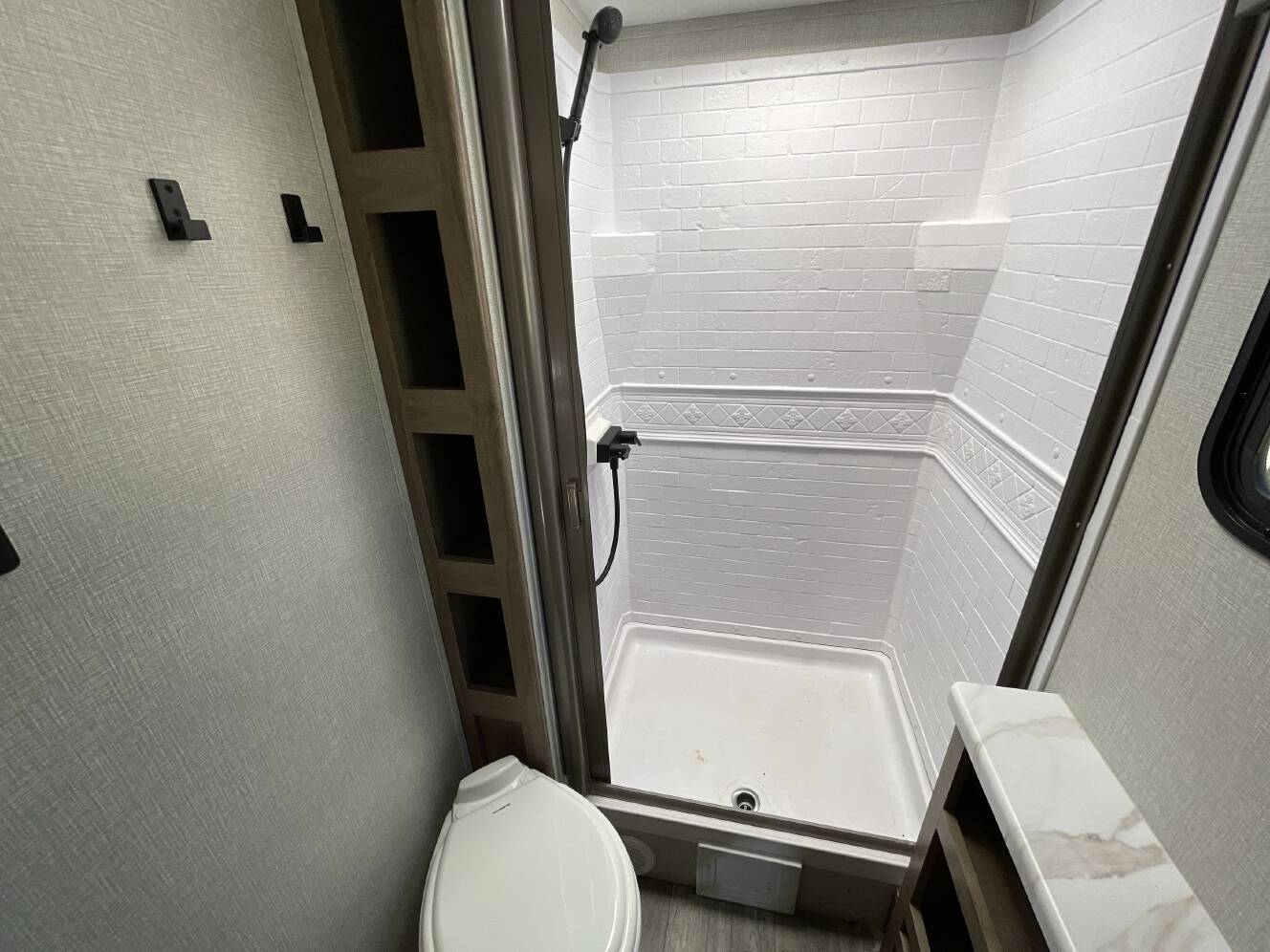 A photo of this 2023 Grand Design IMAGINE XLS 21BHE