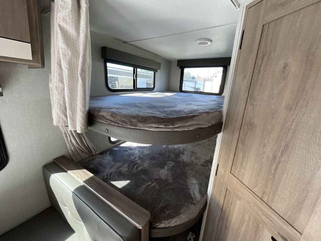 A photo of this 2023 Grand Design IMAGINE XLS 21BHE