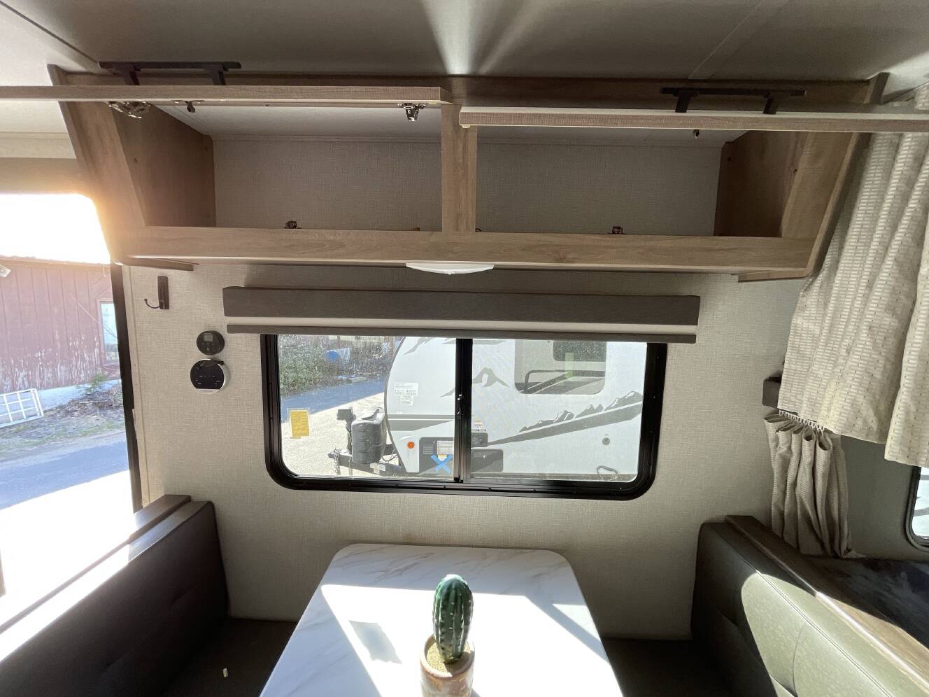 A photo of this 2023 Grand Design IMAGINE XLS 21BHE