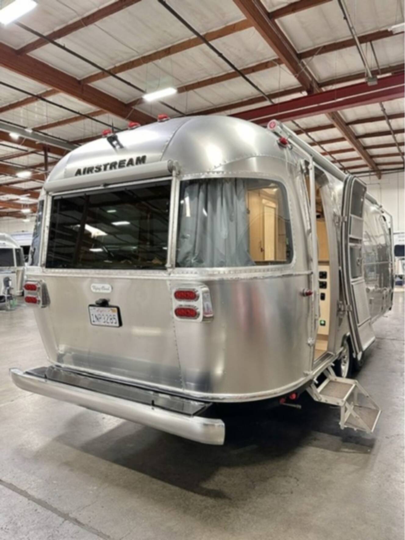 A photo of this 2023 Airstream Flying Cloud 25 Front Bed Queen