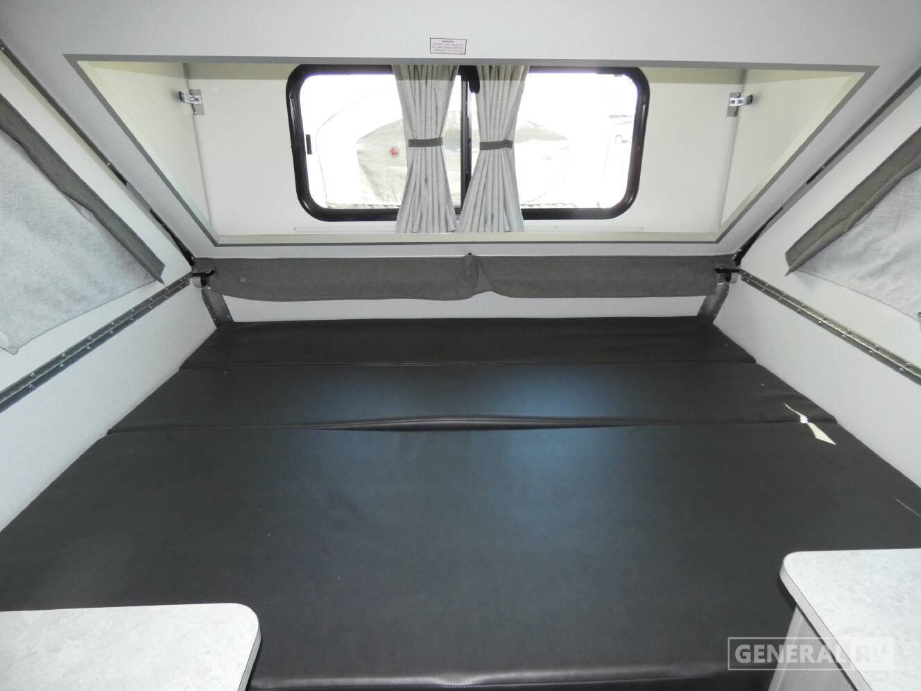 A photo of this 2026 Aliner CLASSIC Rear Sofa