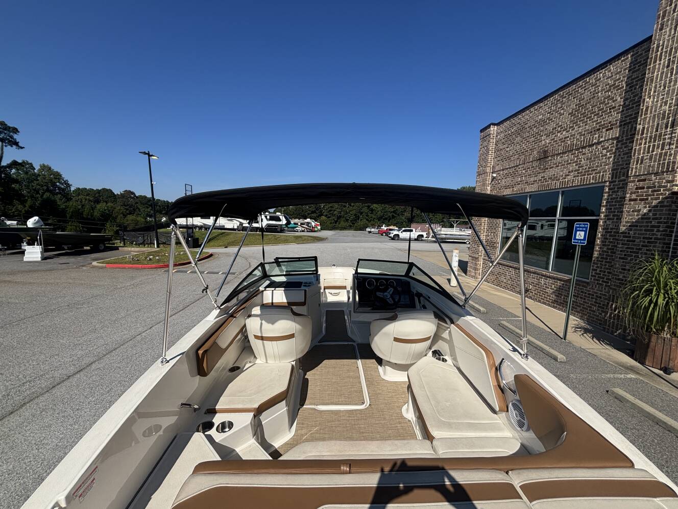 A photo of this 2018 Sea Ray 210 SPX w/MerCruiser 4.5L - 250HP Engine and Trailer
