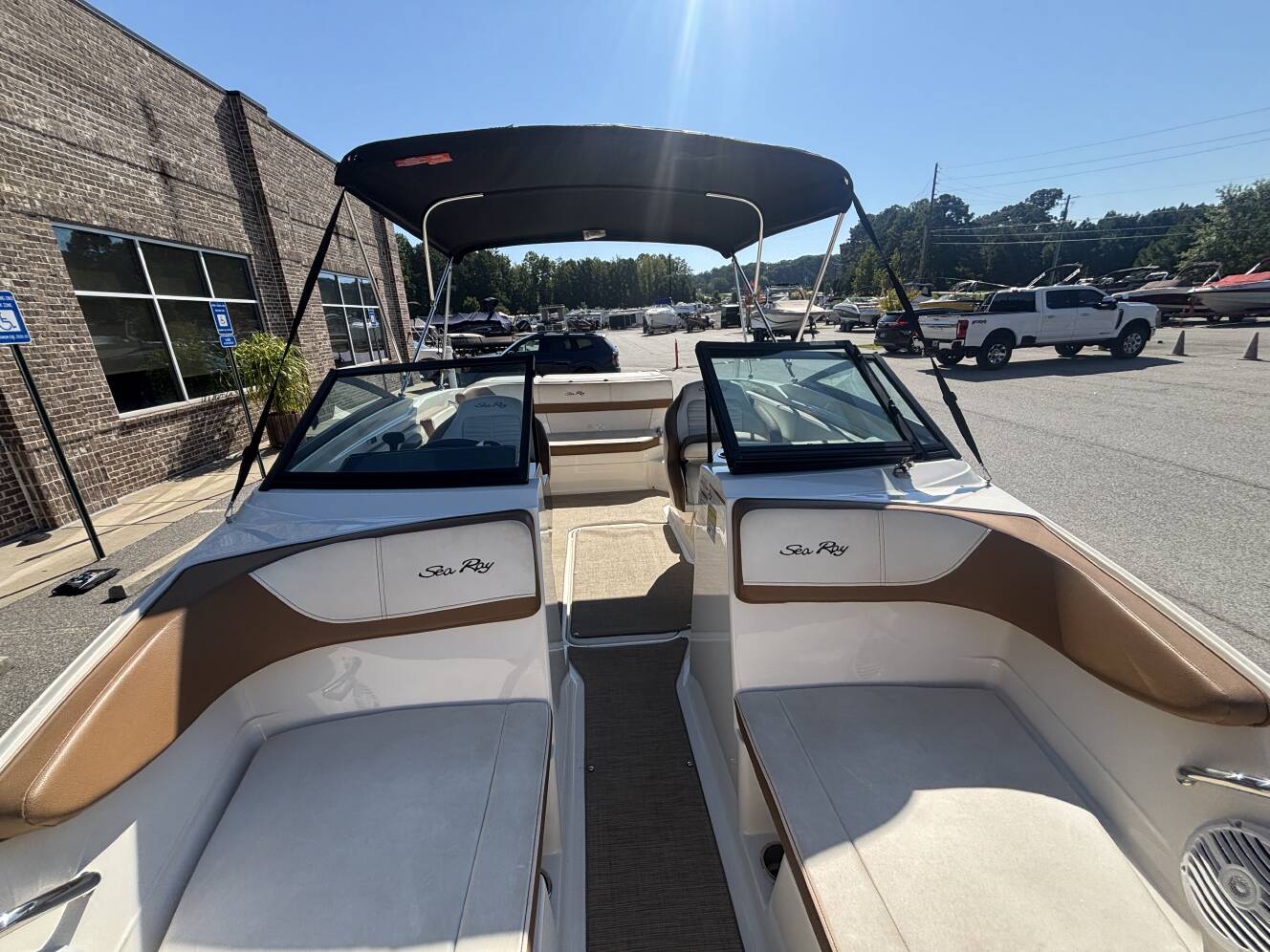 A photo of this 2018 Sea Ray 210 SPX w/MerCruiser 4.5L - 250HP Engine and Trailer