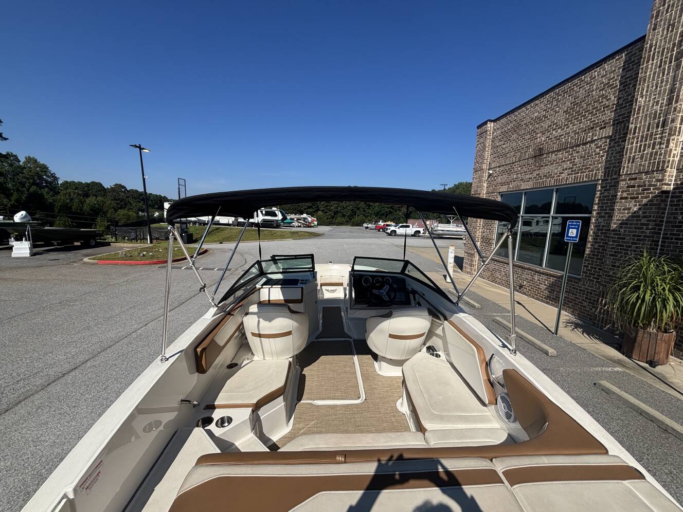 A photo of this 2018 Sea Ray 210 SPX w/MerCruiser 4.5L - 250HP Engine and Trailer