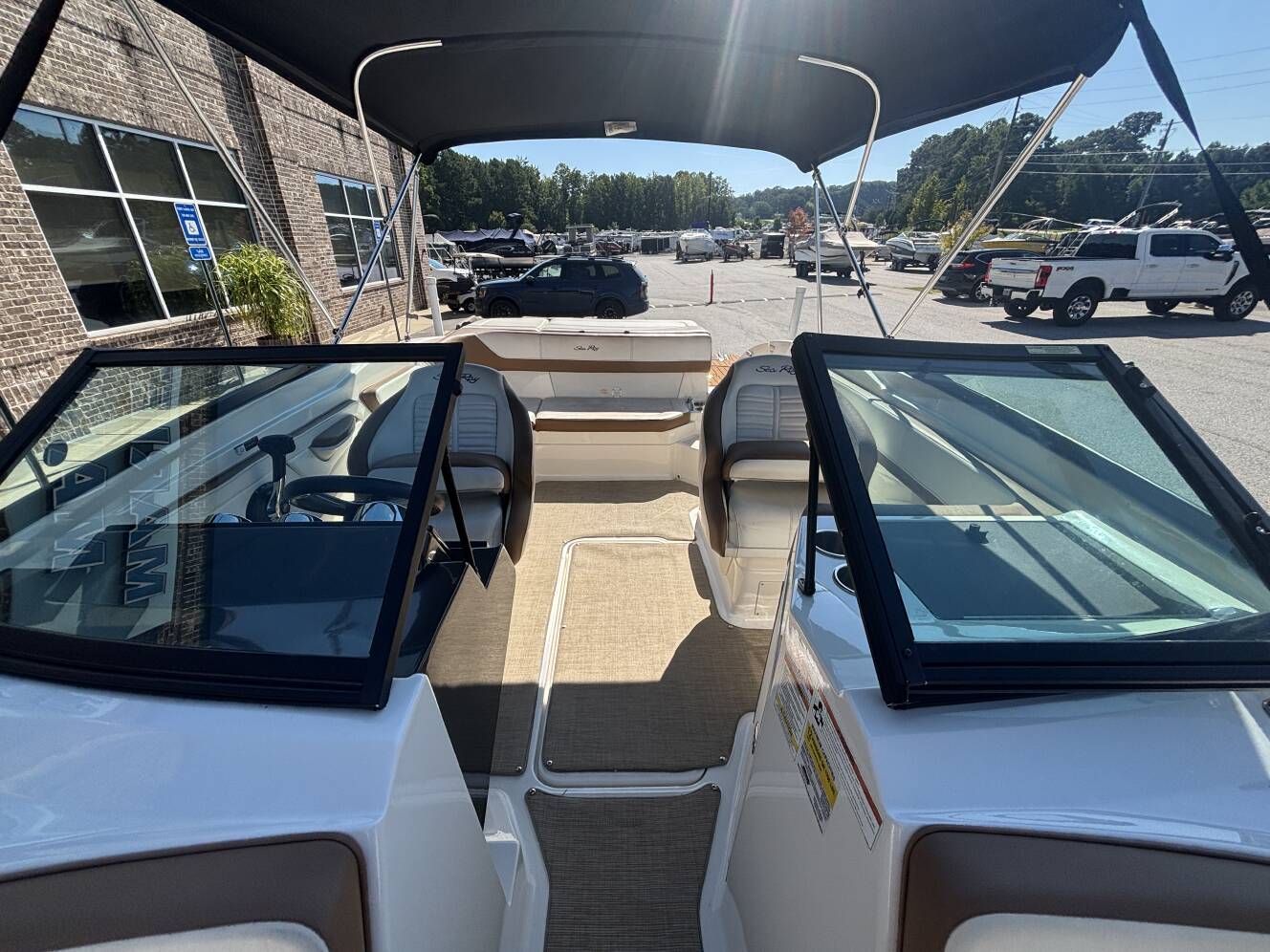 A photo of this 2018 Sea Ray 210 SPX w/MerCruiser 4.5L - 250HP Engine and Trailer