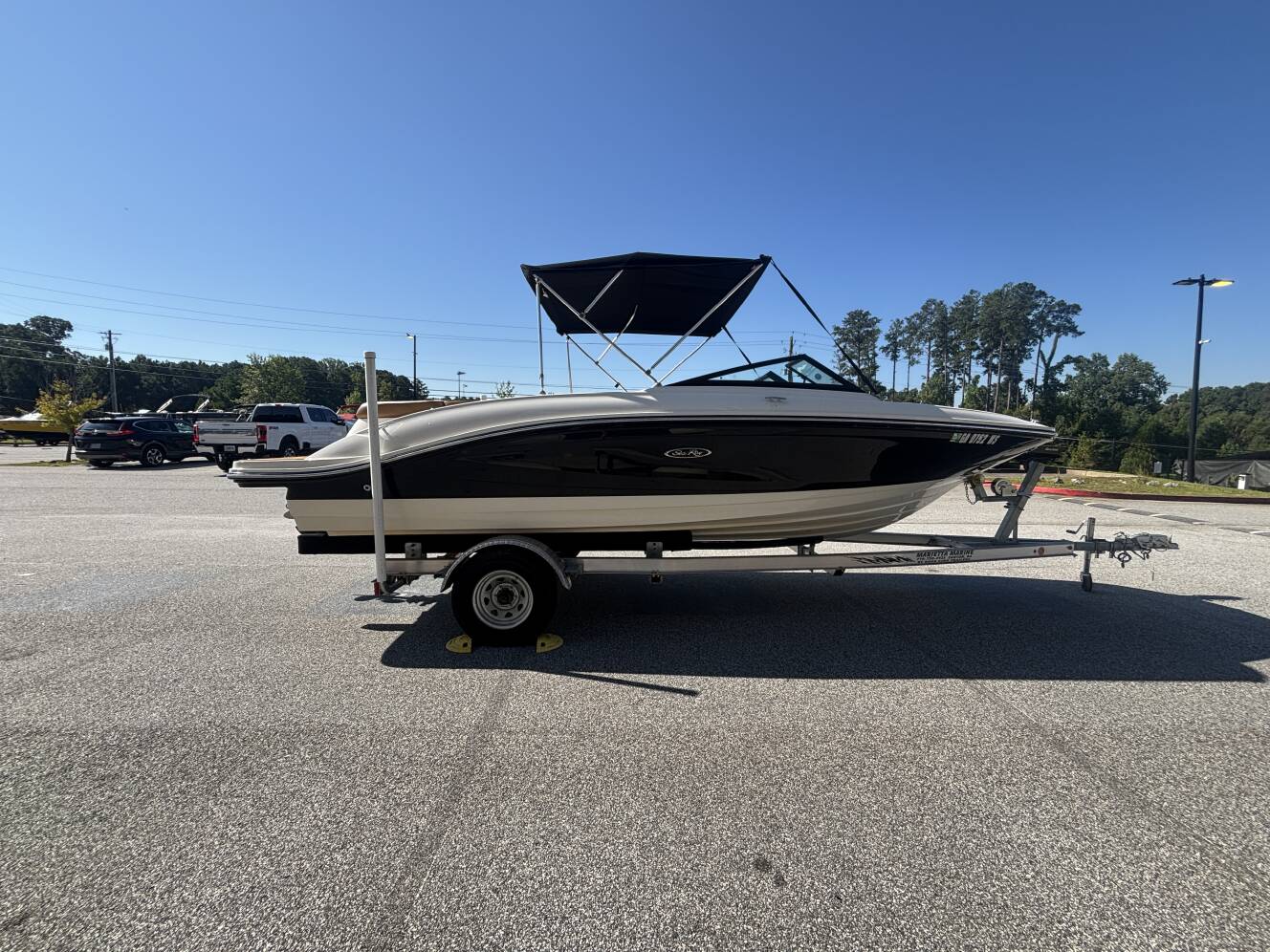 A photo of this 2018 Sea Ray 210 SPX w/MerCruiser 4.5L - 250HP Engine and Trailer